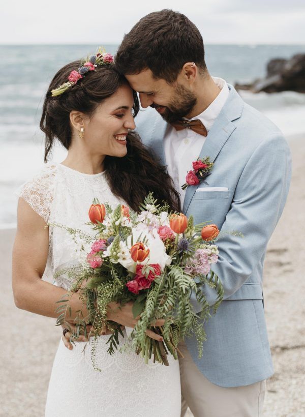 beautiful-husband-wife-posing-beach